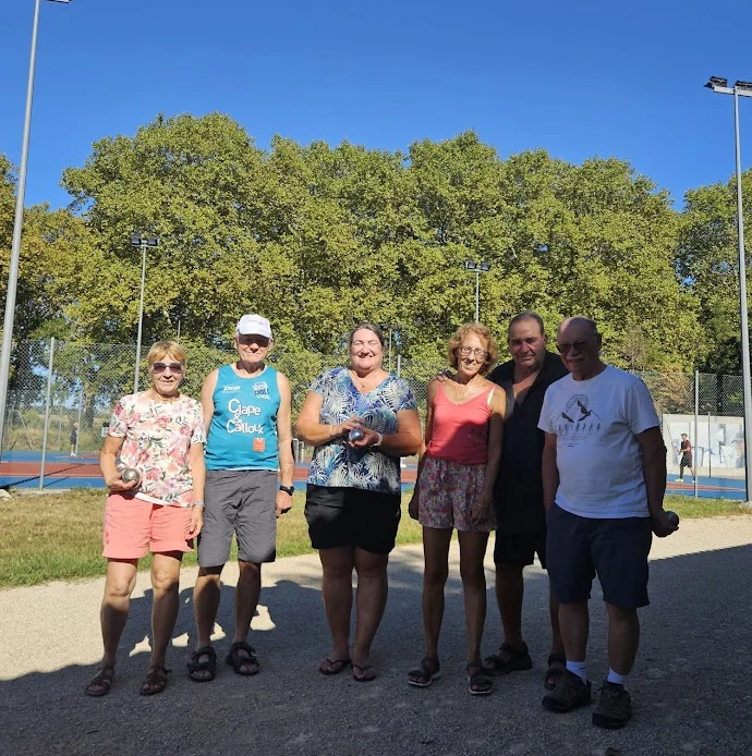 Participants à la pétanque pendant la fête ACFA 2026 à Donneville