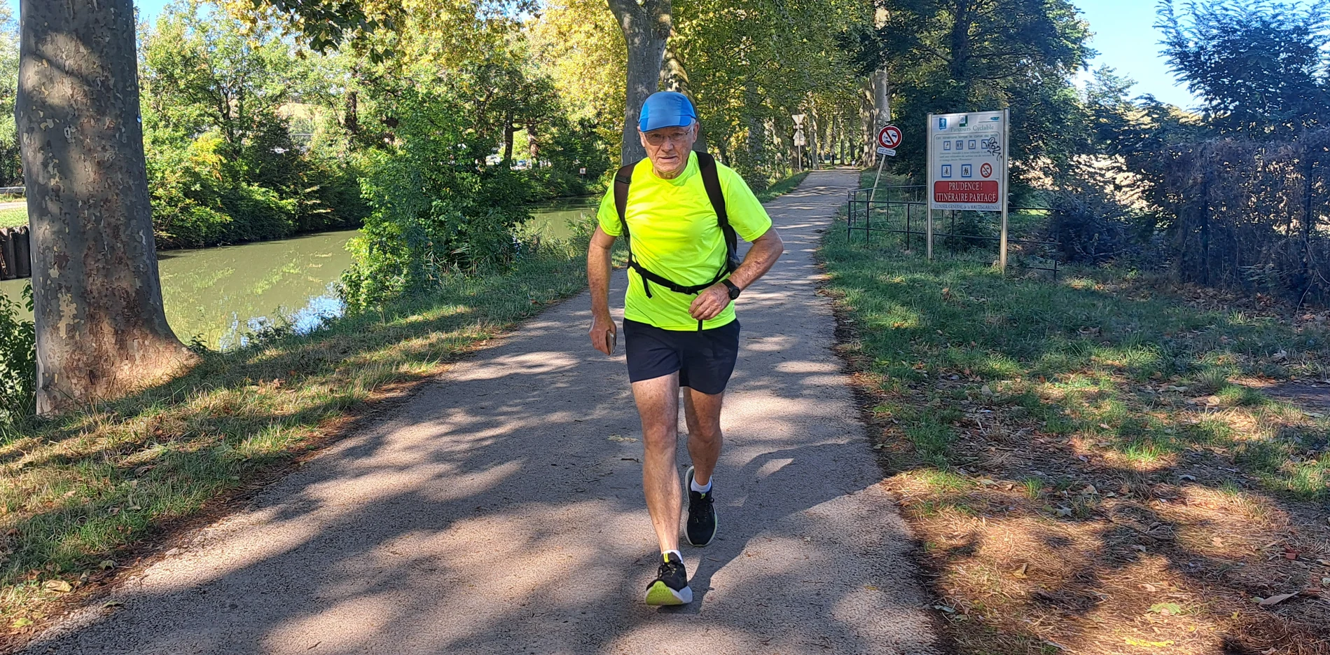 Coureur ACFA le long du Canal du Midi pendant la fête 2026